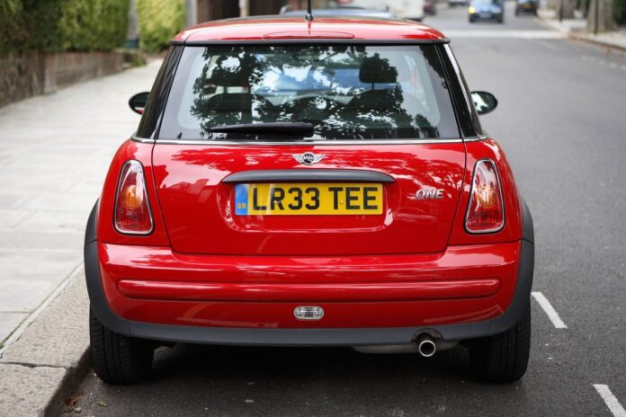 Car number plates looking elegant on red color
